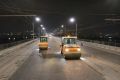 Дорожные дефекты центральной и левой полосы Октябрьского моста в обоих направлениях устраняют подрядчики в Новосибирске